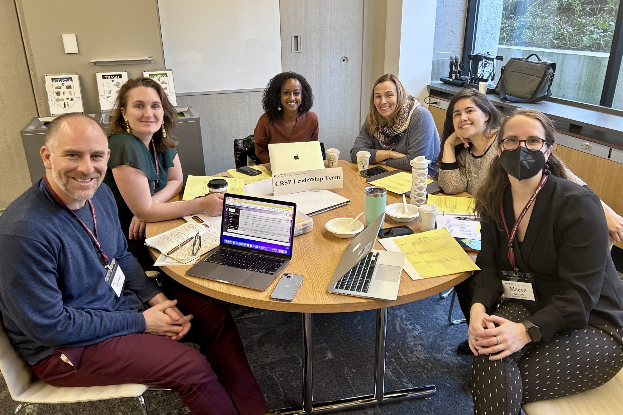 Members of Highlander Institute meet with their faculty advisor, Brittany Tabor Butler, during a Scaling For Impact Team Time session.